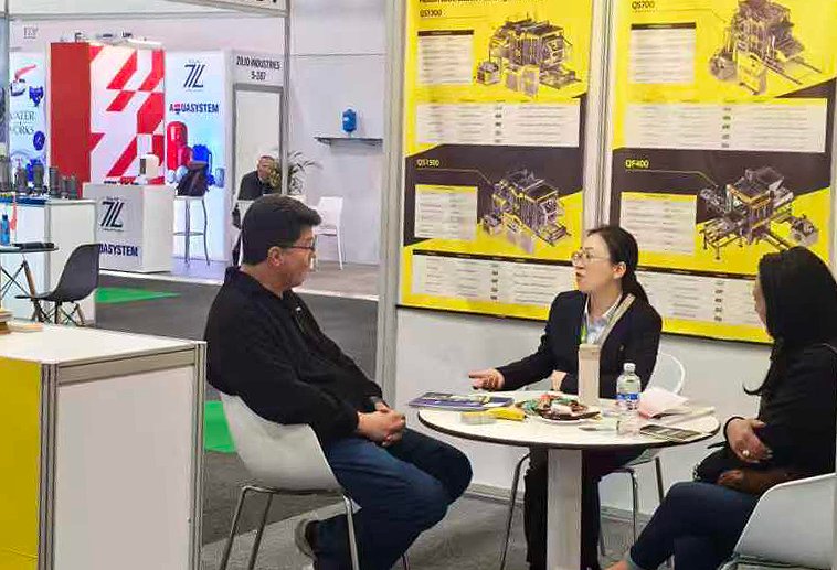 The Qunfeng Machinery team discusses a customized concrete product production line solution with an African client. The Qunfeng Machinery team discusses a customized concrete product production line solution with an African client.