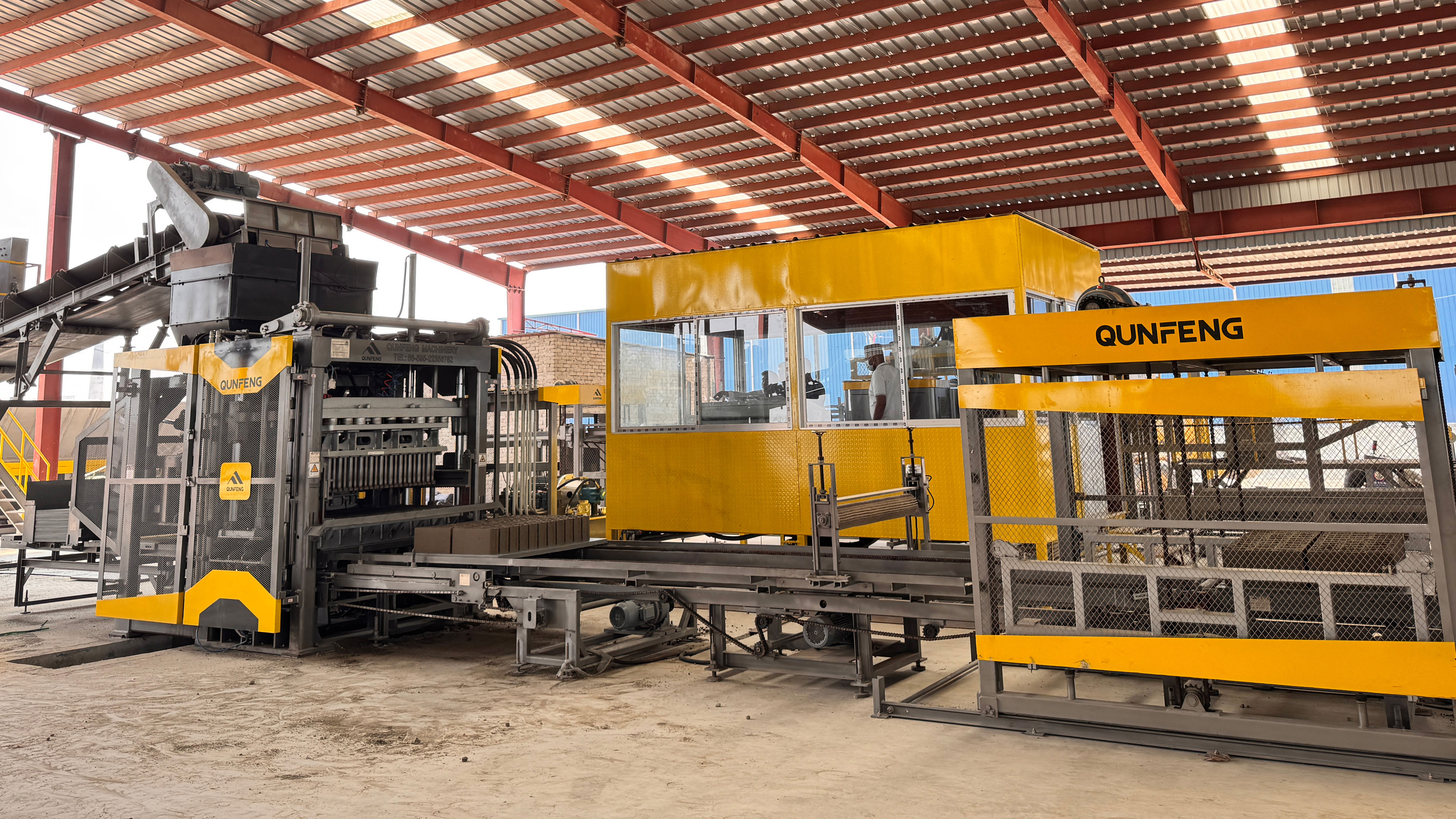 Qunfeng Machinery supporting South Asian infrastructure with efficient block making solutions Qunfeng automated concrete products production line site in Bangladesh