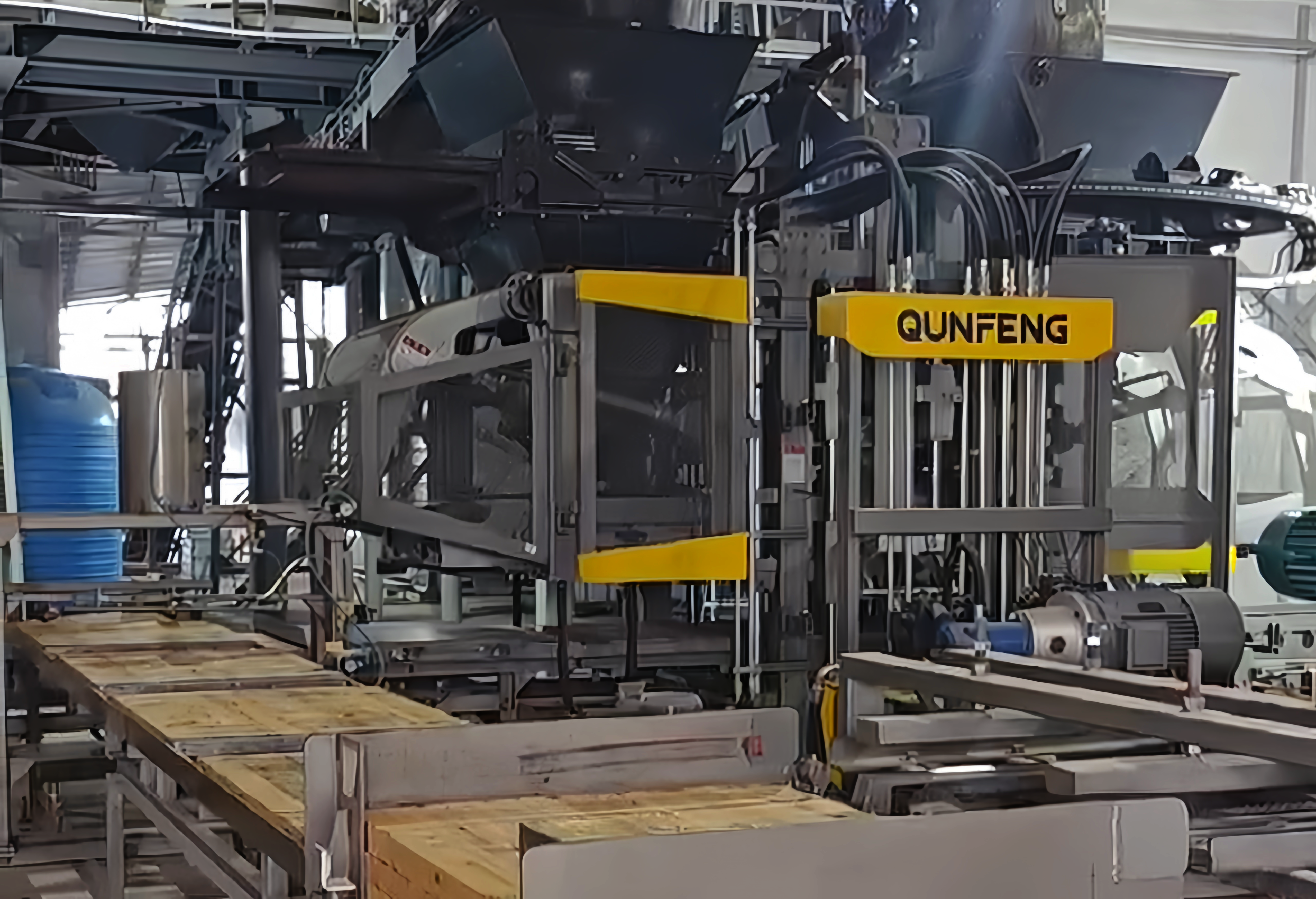 The Qunfeng Machinery QS Series Fully Automatic Concrete Products Production Line in Operation at a Client Site in Kazakhstan The Qunfeng Machinery QS Series Fully Automatic Concrete Products Production Line in Operation at a Client Site in Kazakhstan