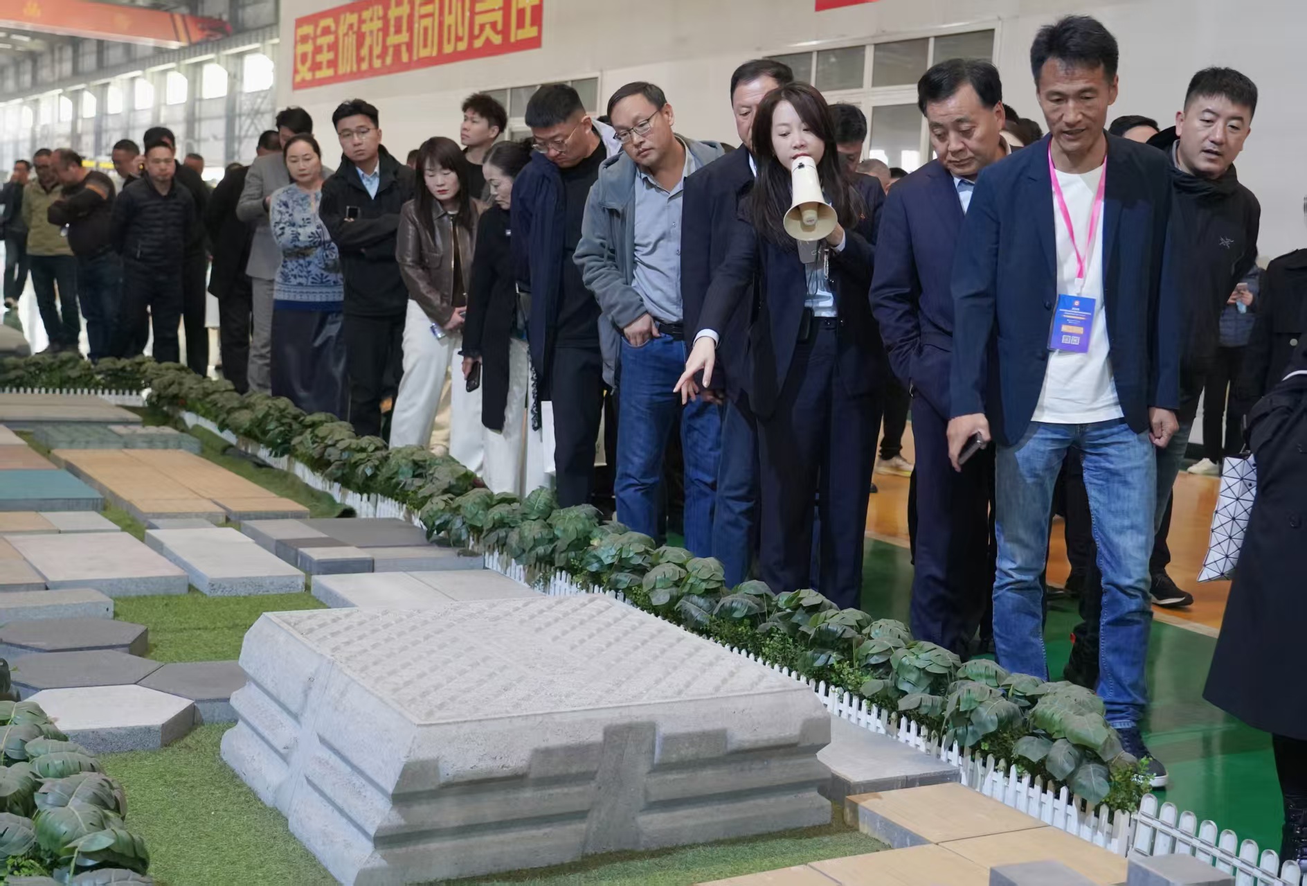 PC Block Industry delegation observing automated dry-cast production line roadbed blocks