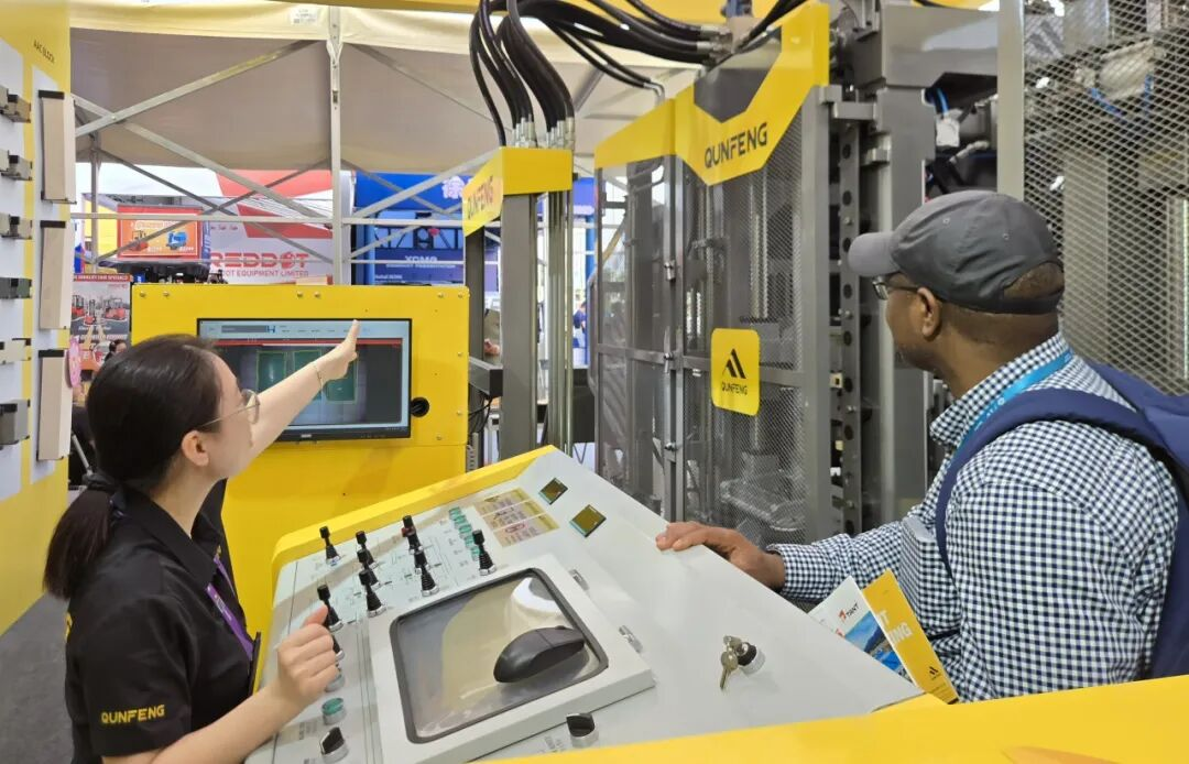 African buyers reviewing Qunfeng block making machines for local infrastructure projects